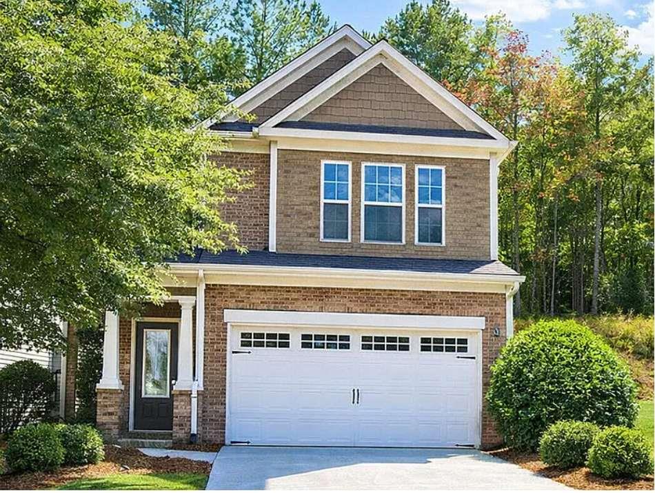 5103 Jack Drive Decatur, GA 30035 - Photo 1 of 34 a front view of a house with a yard