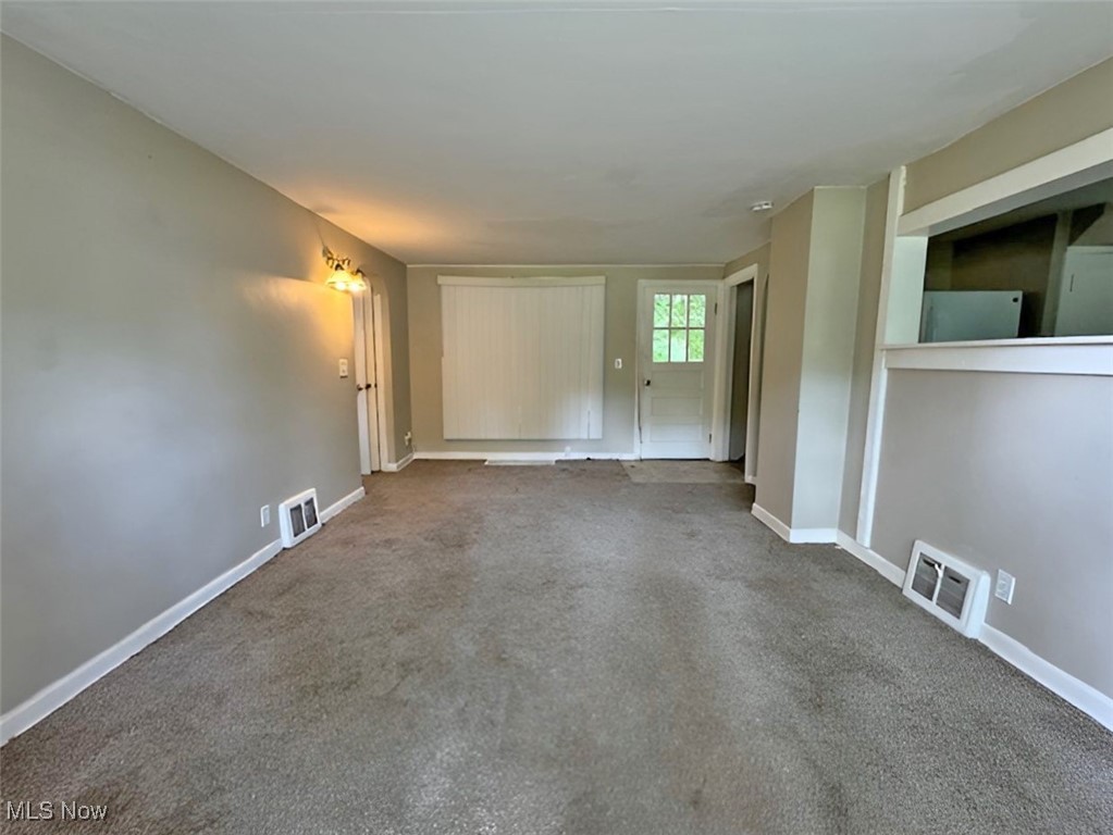 254 Howland Wilson Road Southeast Warren, OH 44484 - Photo 5 of 9 View of unfurnished living room