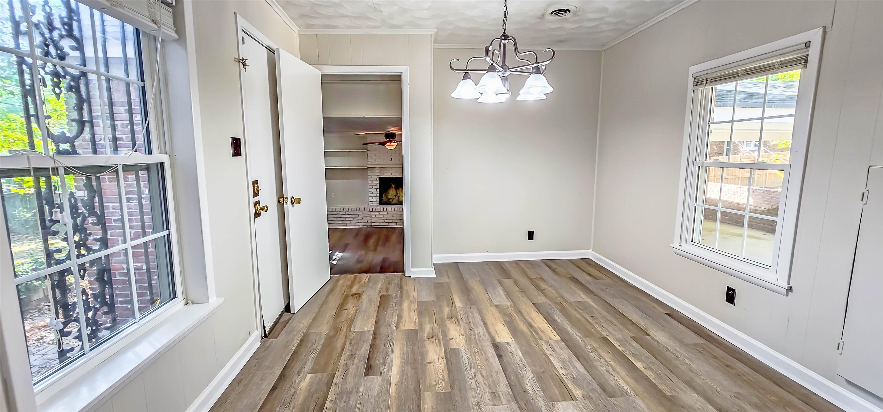 3086 Bannockburn Road Memphis, TN 38128 - Photo 13 of 40 a view of a room with wooden floor staircase and windows