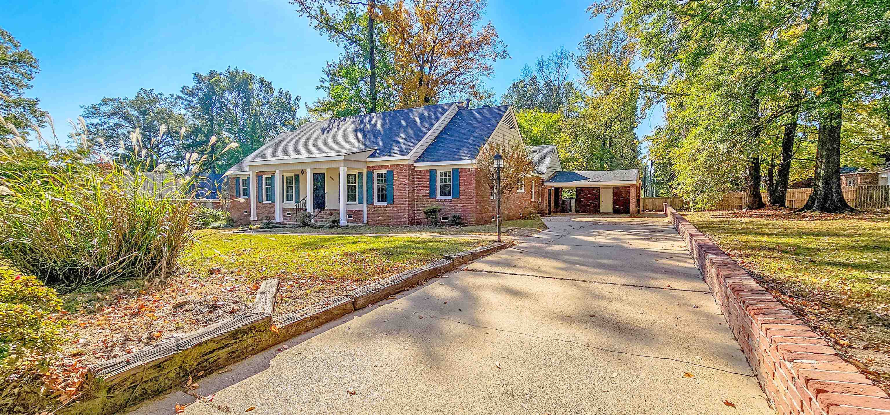 3086 Bannockburn Road Memphis, TN 38128 - Photo 2 of 40 a view of house with outdoor space and swimming pool