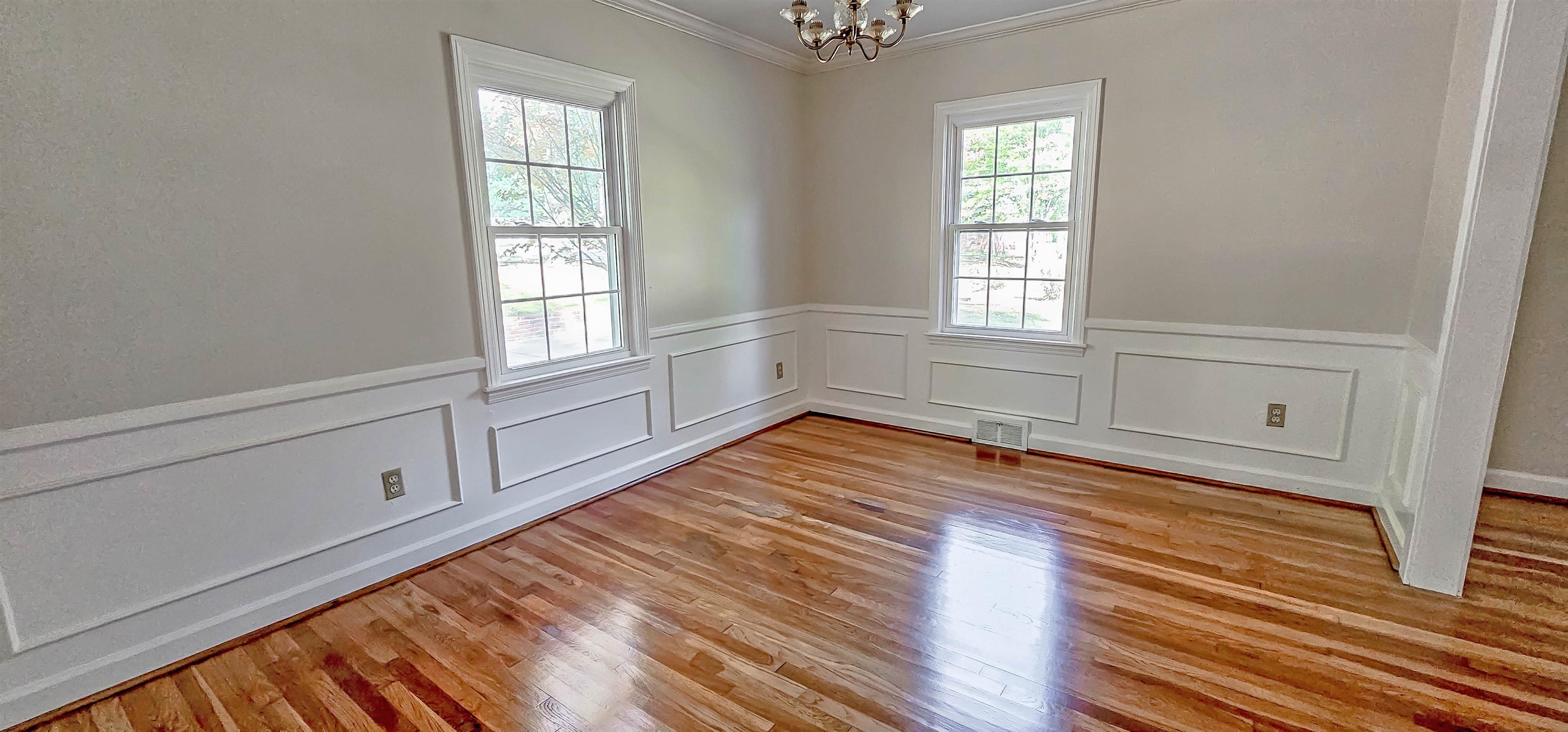 3086 Bannockburn Road Memphis, TN 38128 - Photo 8 of 40 a view of empty room with wooden floor and fan