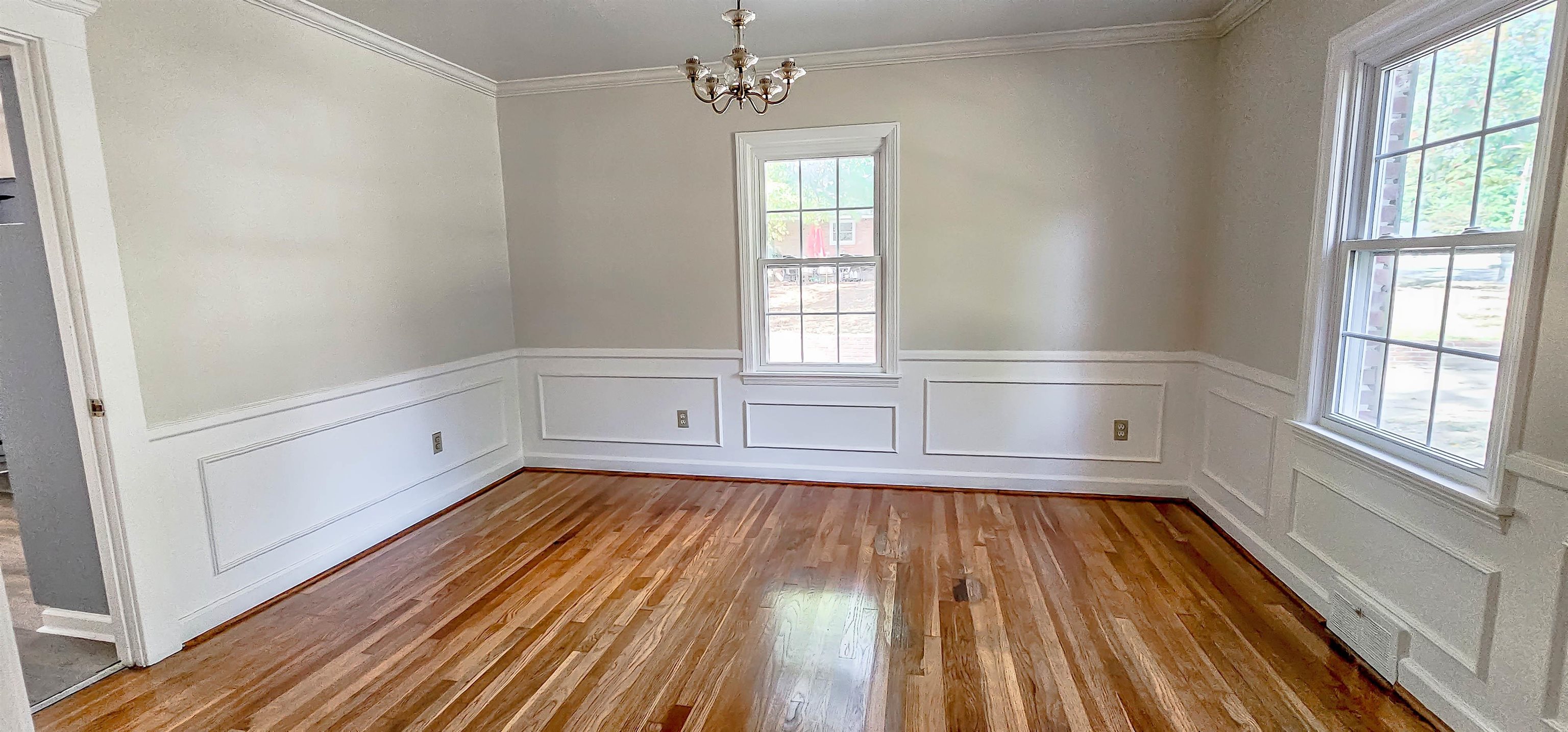 3086 Bannockburn Road Memphis, TN 38128 - Photo 9 of 40 a view of empty room with wooden floor and fan