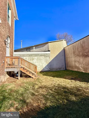 a view of an outdoor space and a building