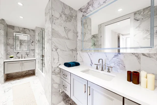 a large kitchen with a stove and a sink