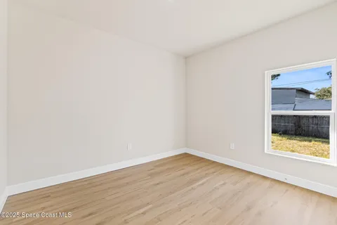 a bathroom with a shower and a toilet