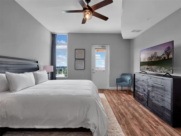 a bedroom with a bed and furniture