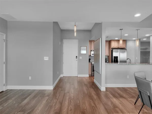 a view of a livingroom with furniture and window
