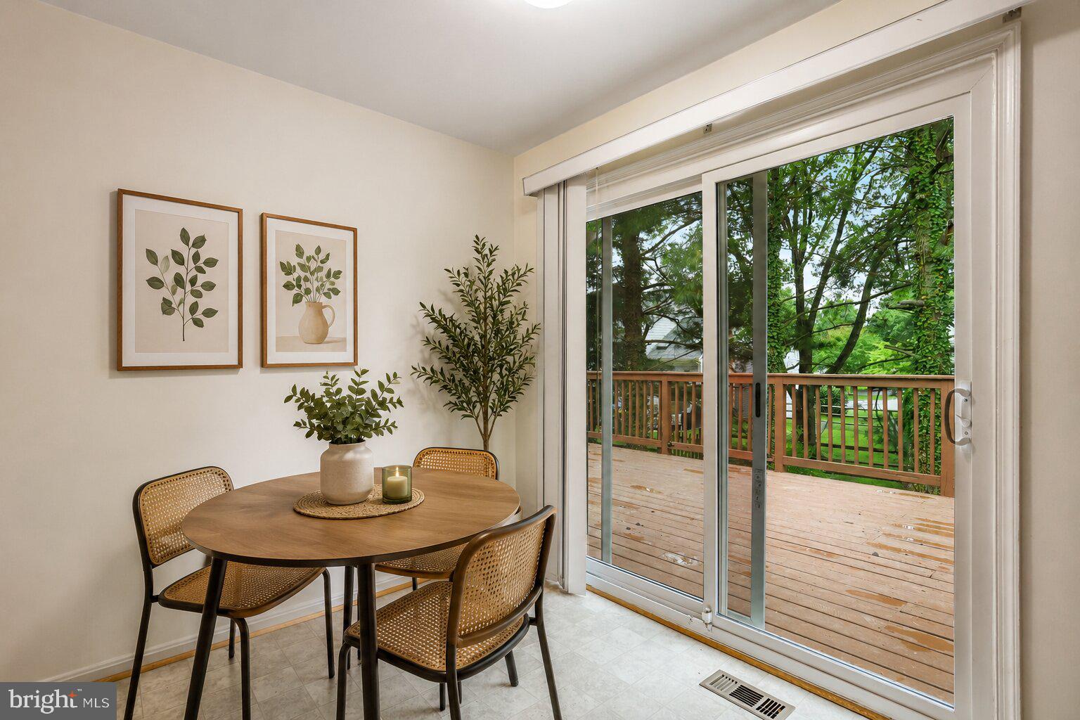 17303 Buehler Road Olney, MD 20832 - Photo 6 of 14 a view of a room that has a table and chairs in the room