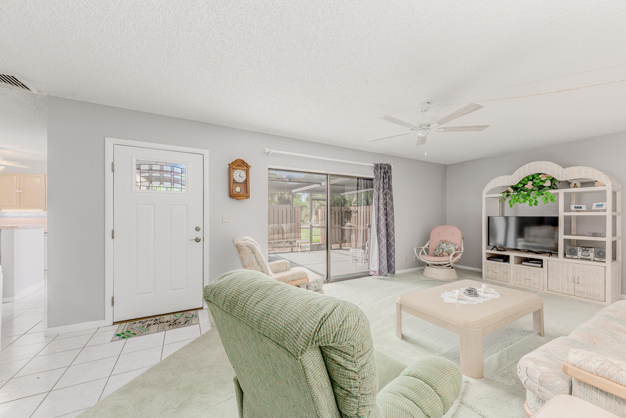 Undisclosed Address Stuart, FL 34997 - Photo 7 of 20 a living room with furniture and a large window