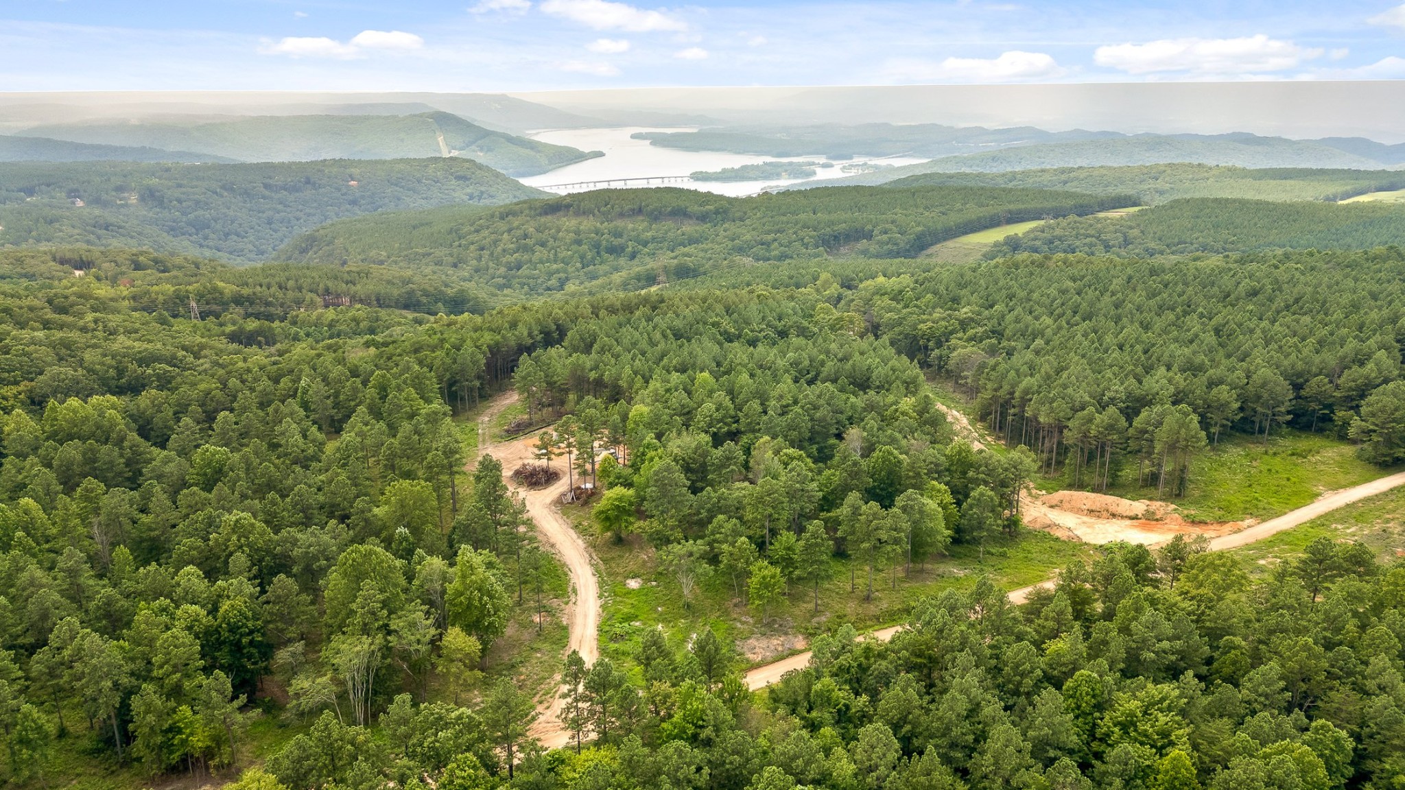 0 Whispering Way Guild, TN 37340 - Photo 1 of 39 a view of a lake with a city