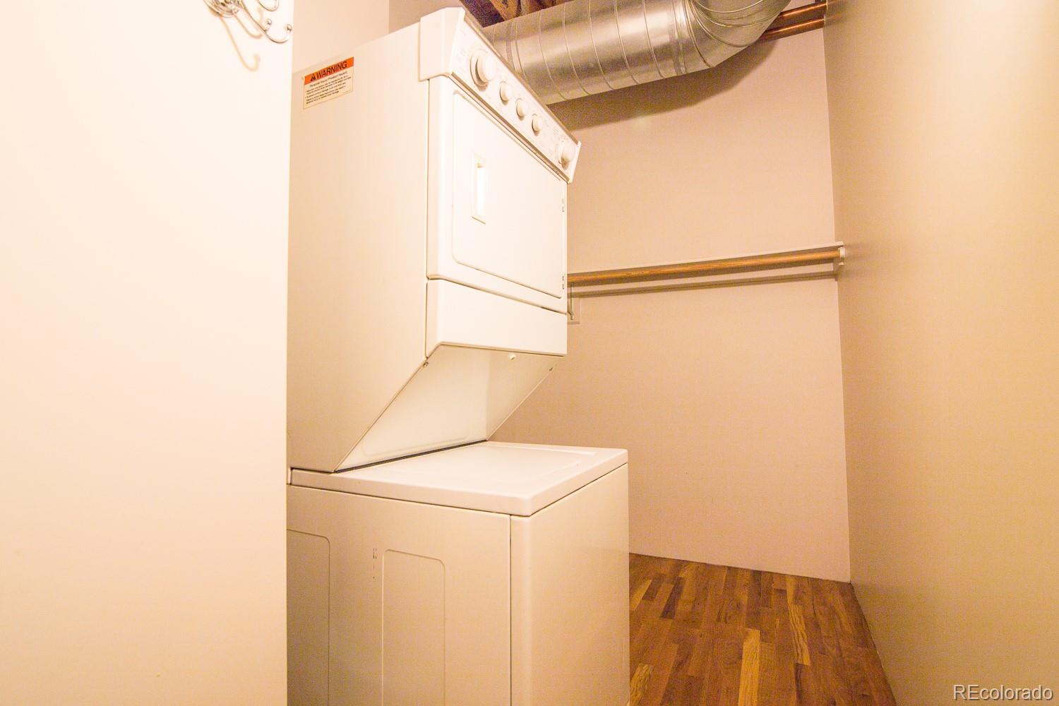 1801 Wynkoop Street, Unit 315 Denver, CO 80202 - Photo 15 of 26 a utility room with dryer and washer