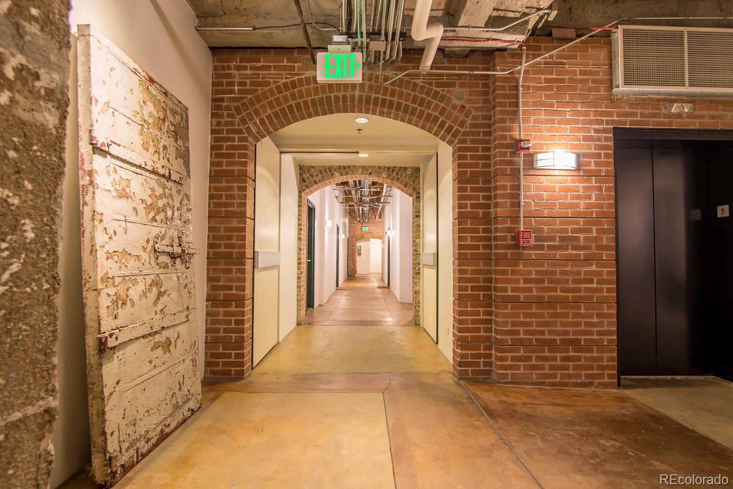 1801 Wynkoop Street, Unit 315 Denver, CO 80202 - Photo 26 of 26 a view of a brick house with a large door