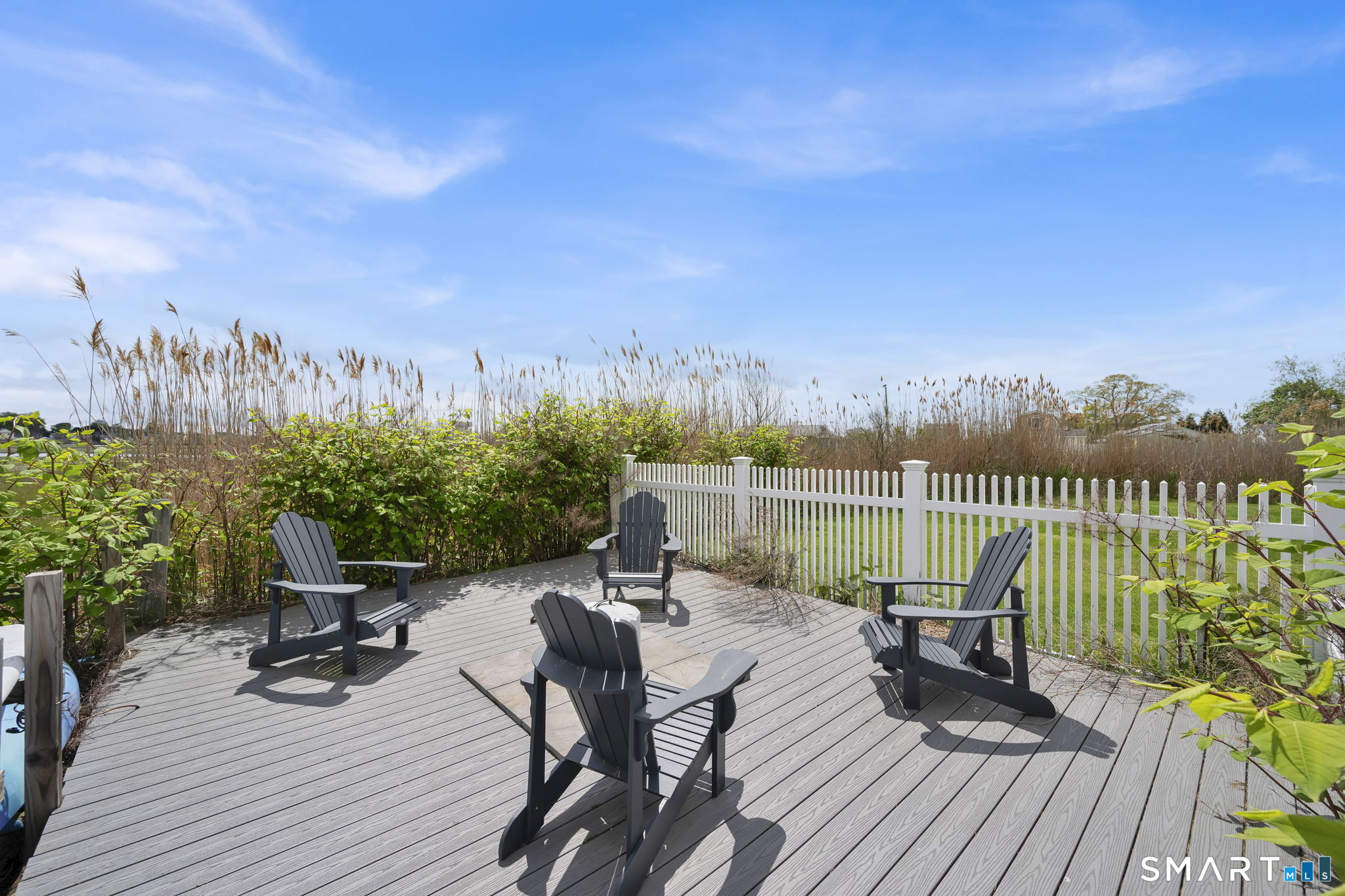 96 Chalker Beach Road Old Saybrook, CT 06475 - Photo 11 of 33 a view of a chairs on the roof deck