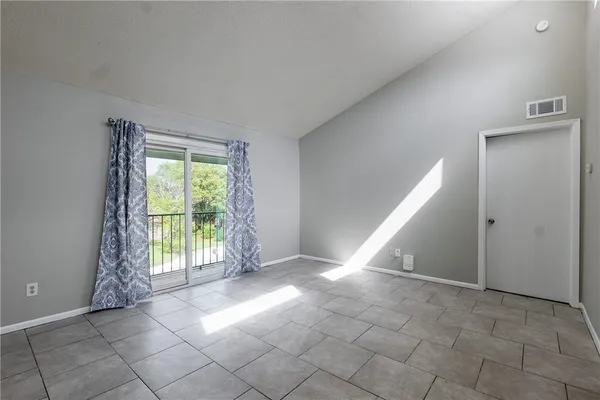 an empty room with windows
