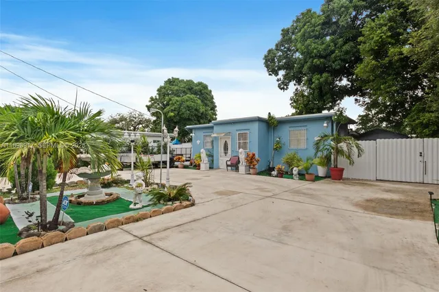 front view of a house with a patio