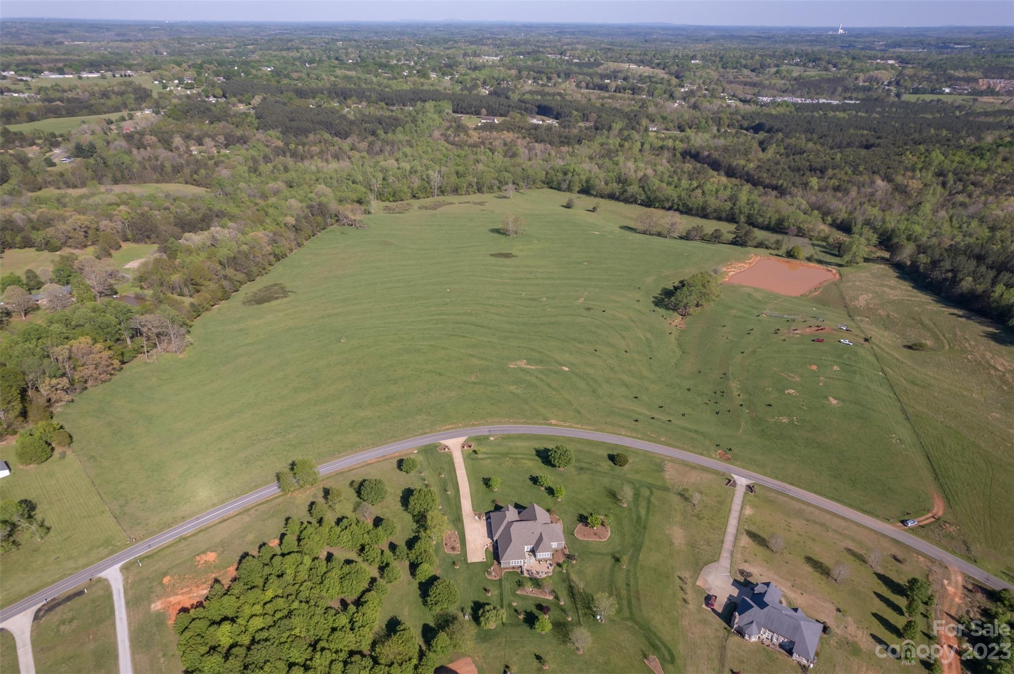 4 Morningstar Lake Road Forest City, NC 28043 - Photo 4 of 10 an aerial view of residential houses with outdoor space