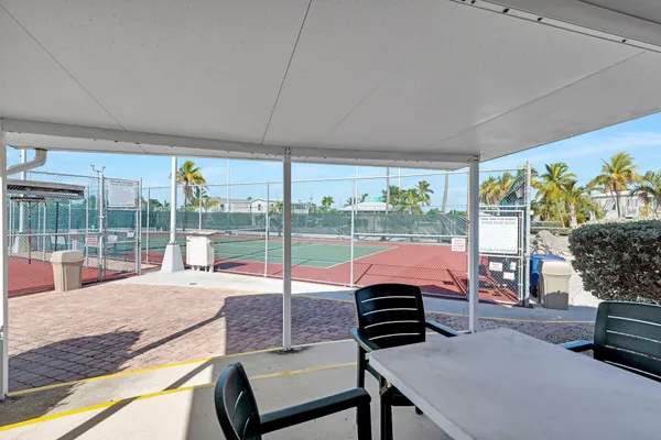 a basketball court with view of city