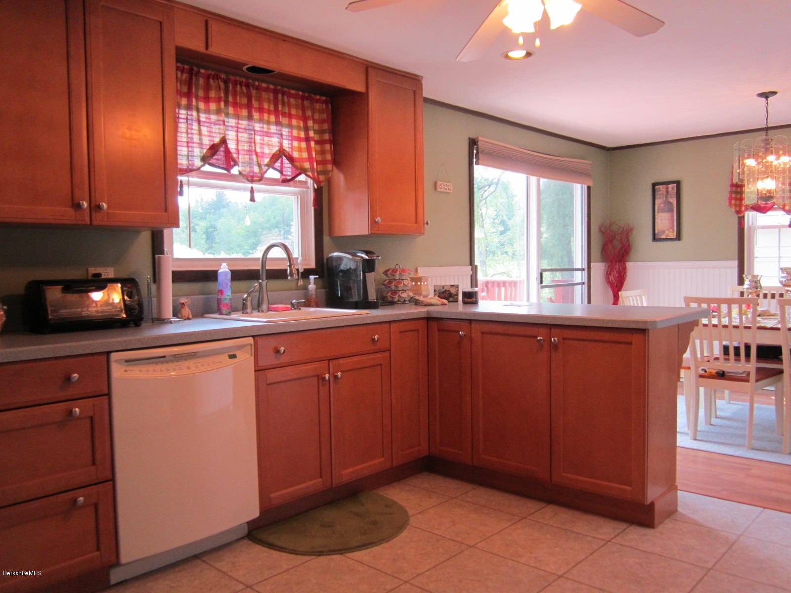 822 Middle Road Clarksburg, MA 01247 - Photo 2 of 14 a kitchen with stainless steel appliances a sink window and cabinets