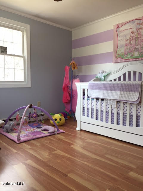 822 Middle Road Clarksburg, MA 01247 - Photo 11 of 14 a bedroom with a bed and window