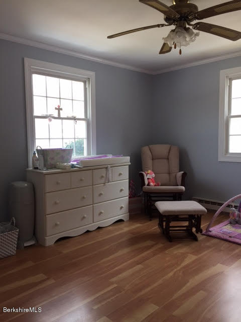 822 Middle Road Clarksburg, MA 01247 - Photo 10 of 14 a living room with furniture and a window