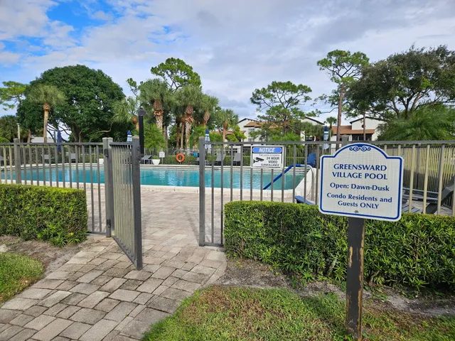 a park bench sitting in the middle of a park