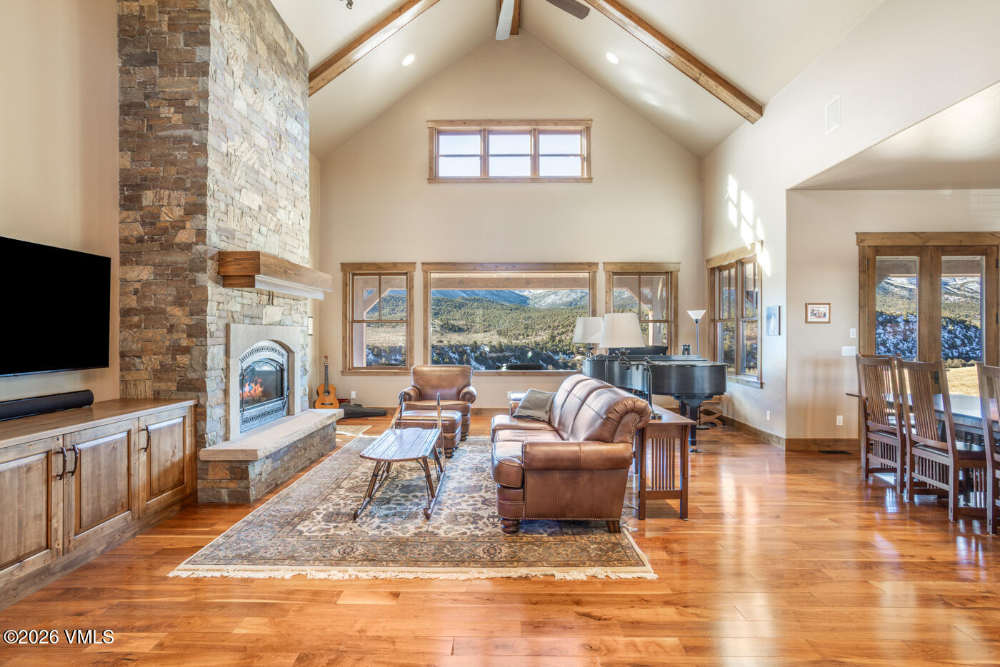 34900 Colorado River Road McCoy, CO 80463 - Photo 10 of 46 a living room with fireplace furniture and a flat screen tv