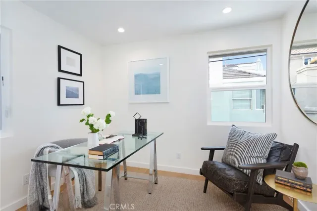 a room with furniture and wooden floor