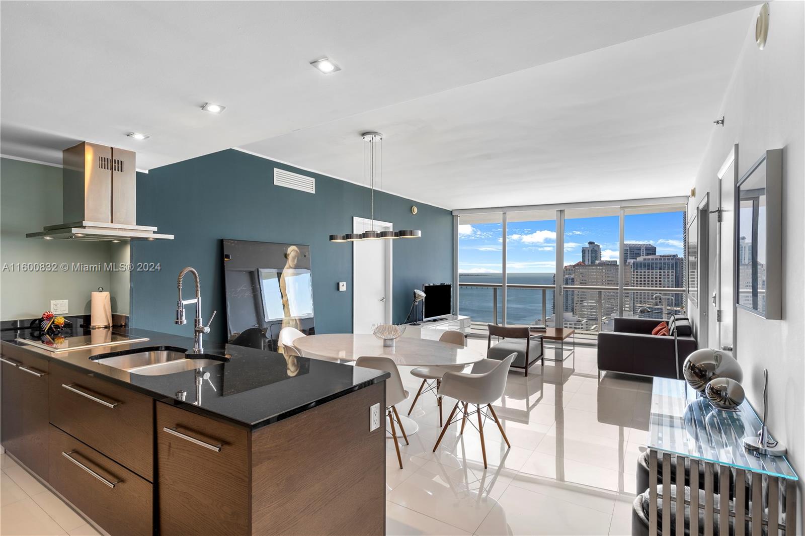 495 Brickell Avenue, Unit 3305 Miami, FL 33131 - Photo 3 of 30 a view of a dining room with furniture window and outside view