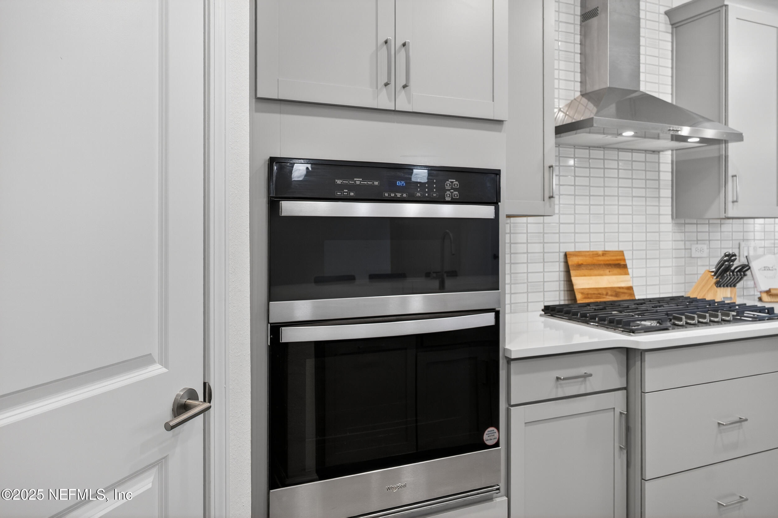 267 Twilight Lane St. Augustine, FL 32095 - Photo 13 of 50 a kitchen with granite countertop cabinets stainless steel appliances and a counter space