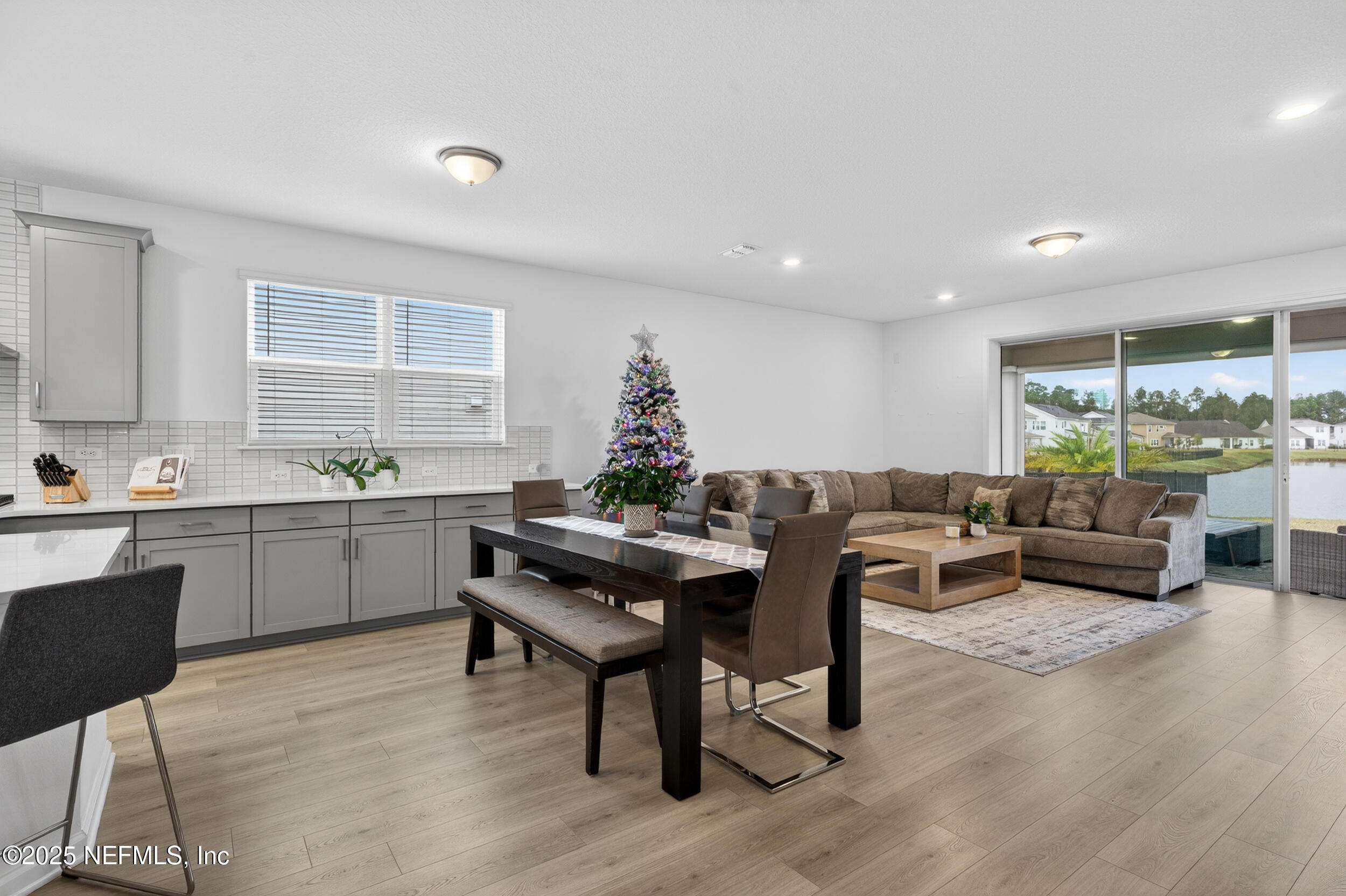 267 Twilight Lane St. Augustine, FL 32095 - Photo 14 of 50 a living room with furniture a dining table and a large window