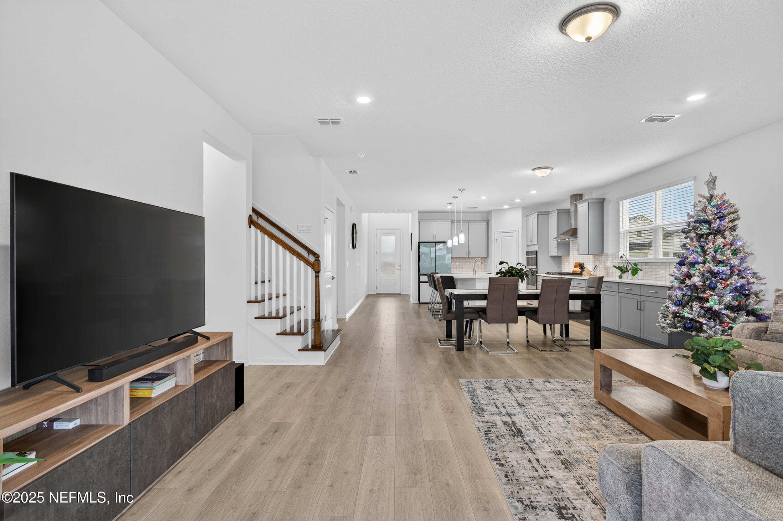 267 Twilight Lane St. Augustine, FL 32095 - Photo 18 of 50 a living room with furniture and a flat screen tv