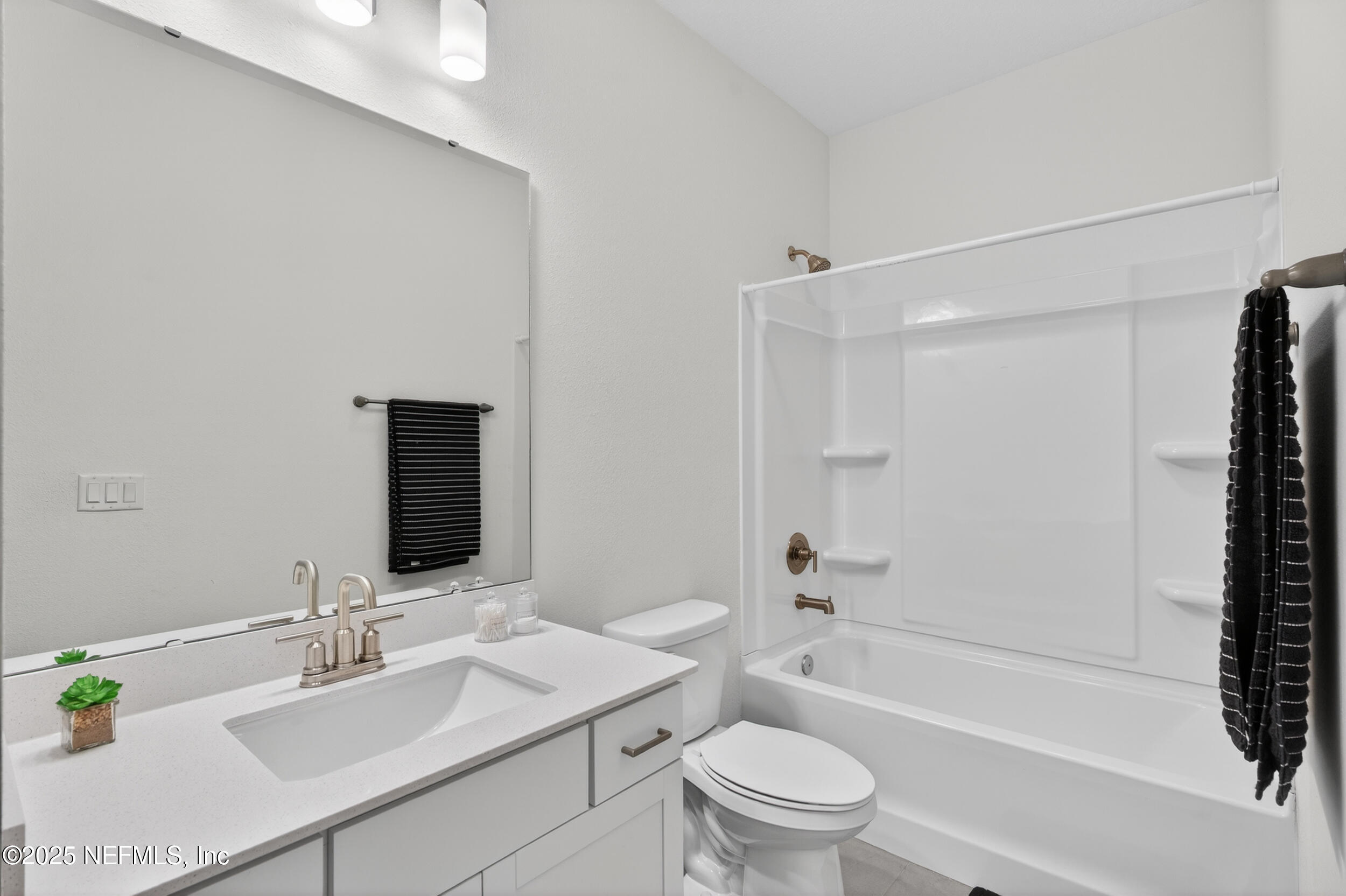 267 Twilight Lane St. Augustine, FL 32095 - Photo 31 of 50 a bathroom with a sink toilet and shower