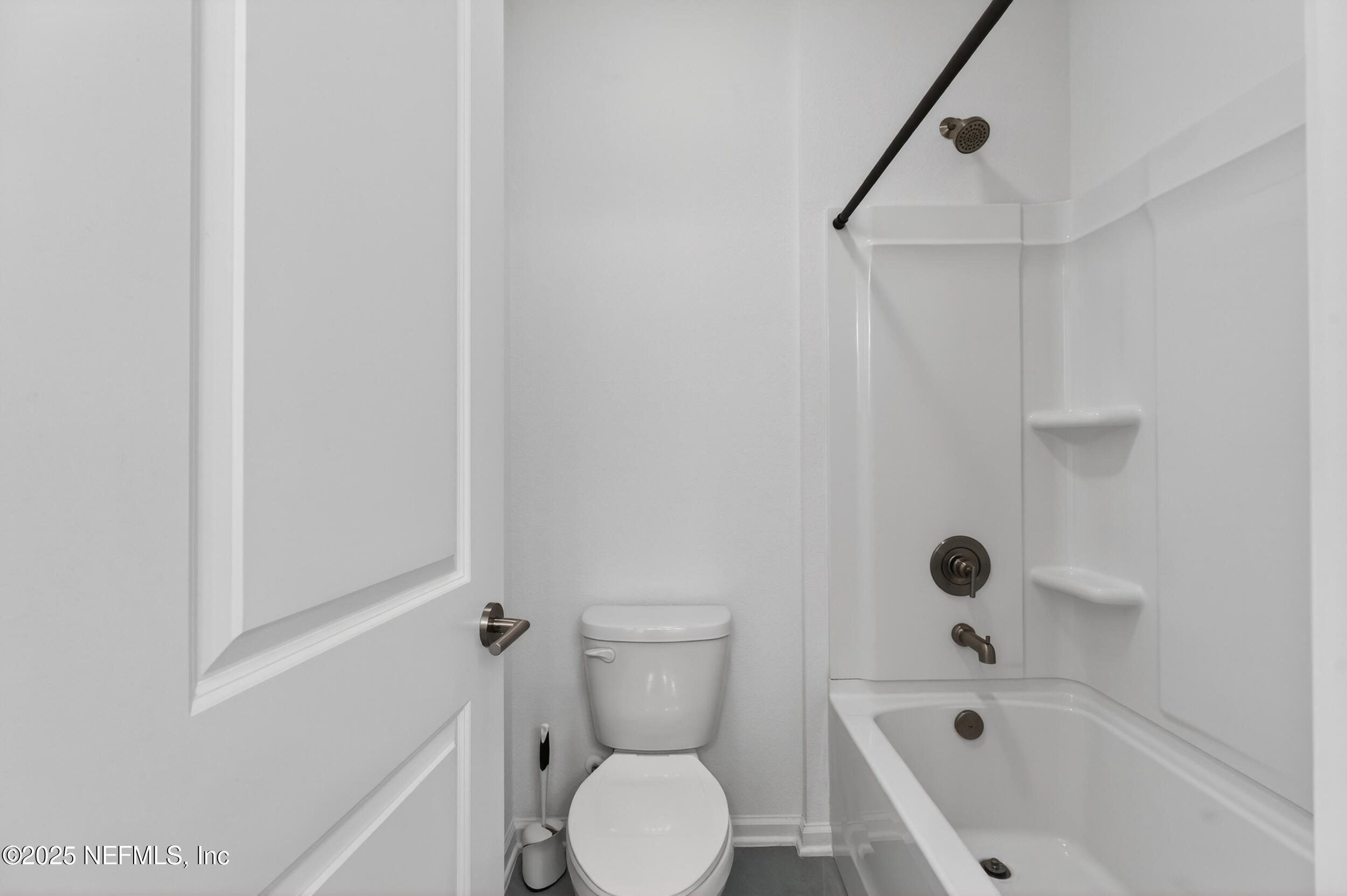 267 Twilight Lane St. Augustine, FL 32095 - Photo 34 of 50 a bathroom with a toilet and a bathtub