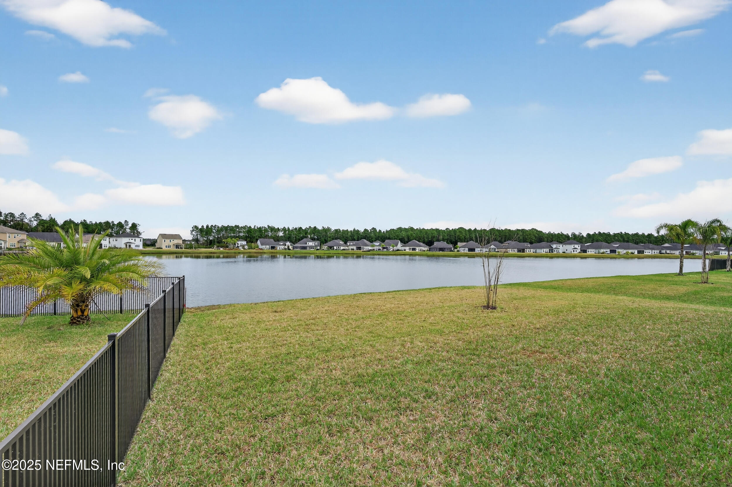 267 Twilight Lane St. Augustine, FL 32095 - Photo 47 of 50 a view of a lake with a big yard