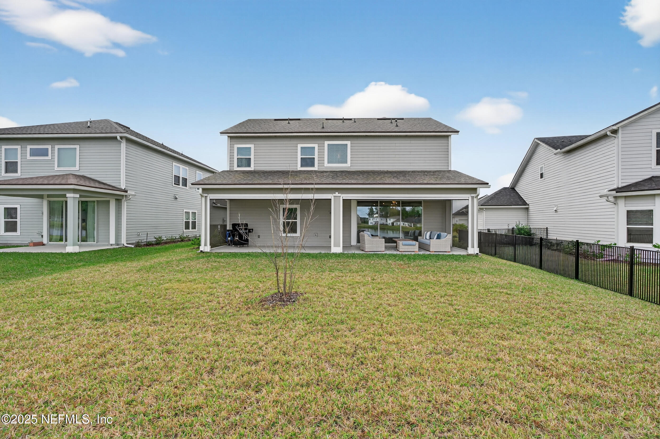 267 Twilight Lane St. Augustine, FL 32095 - Photo 48 of 50 a view of a house with a garden and yard