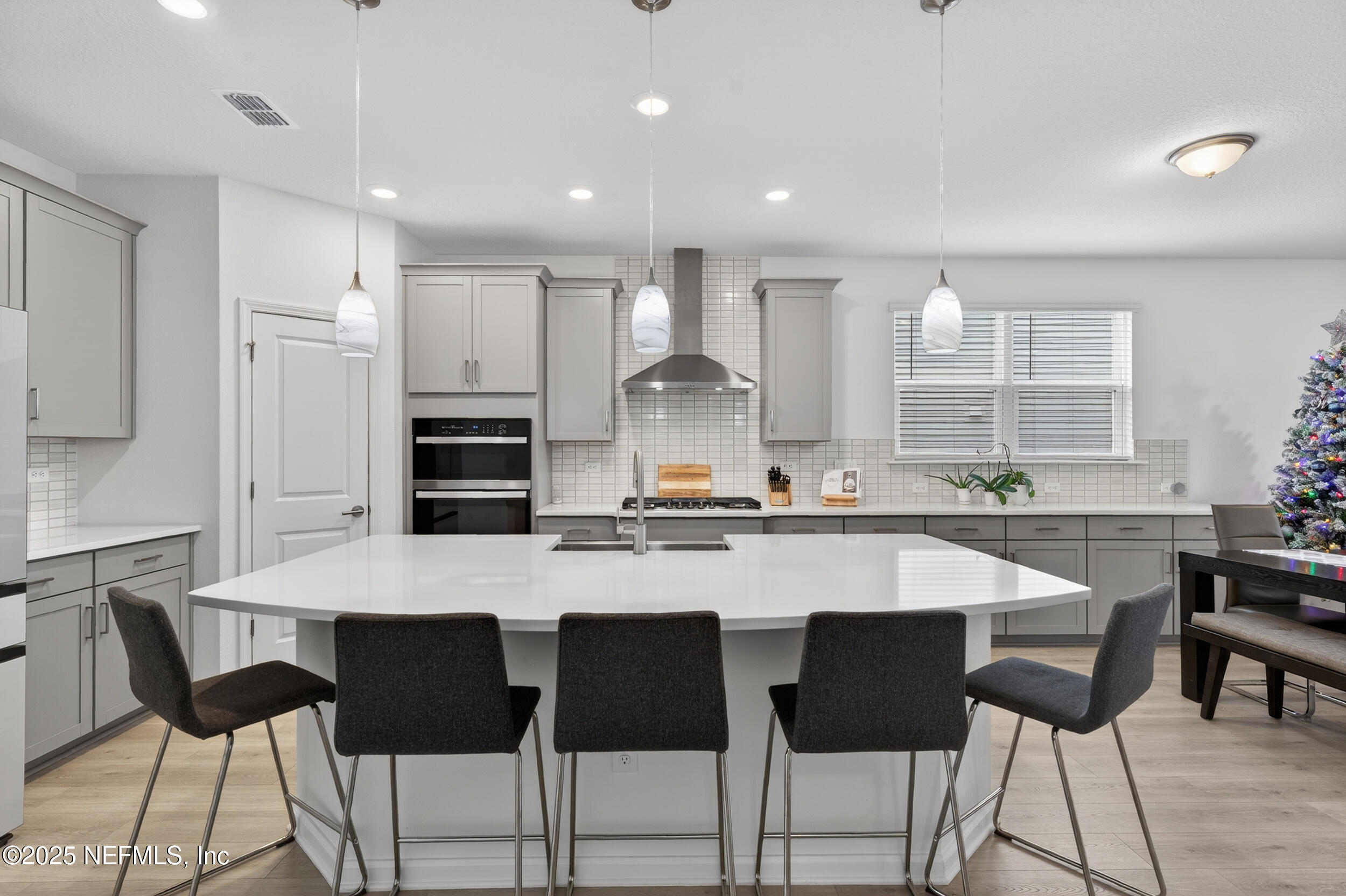267 Twilight Lane St. Augustine, FL 32095 - Photo 6 of 50 a large kitchen with a table and chairs