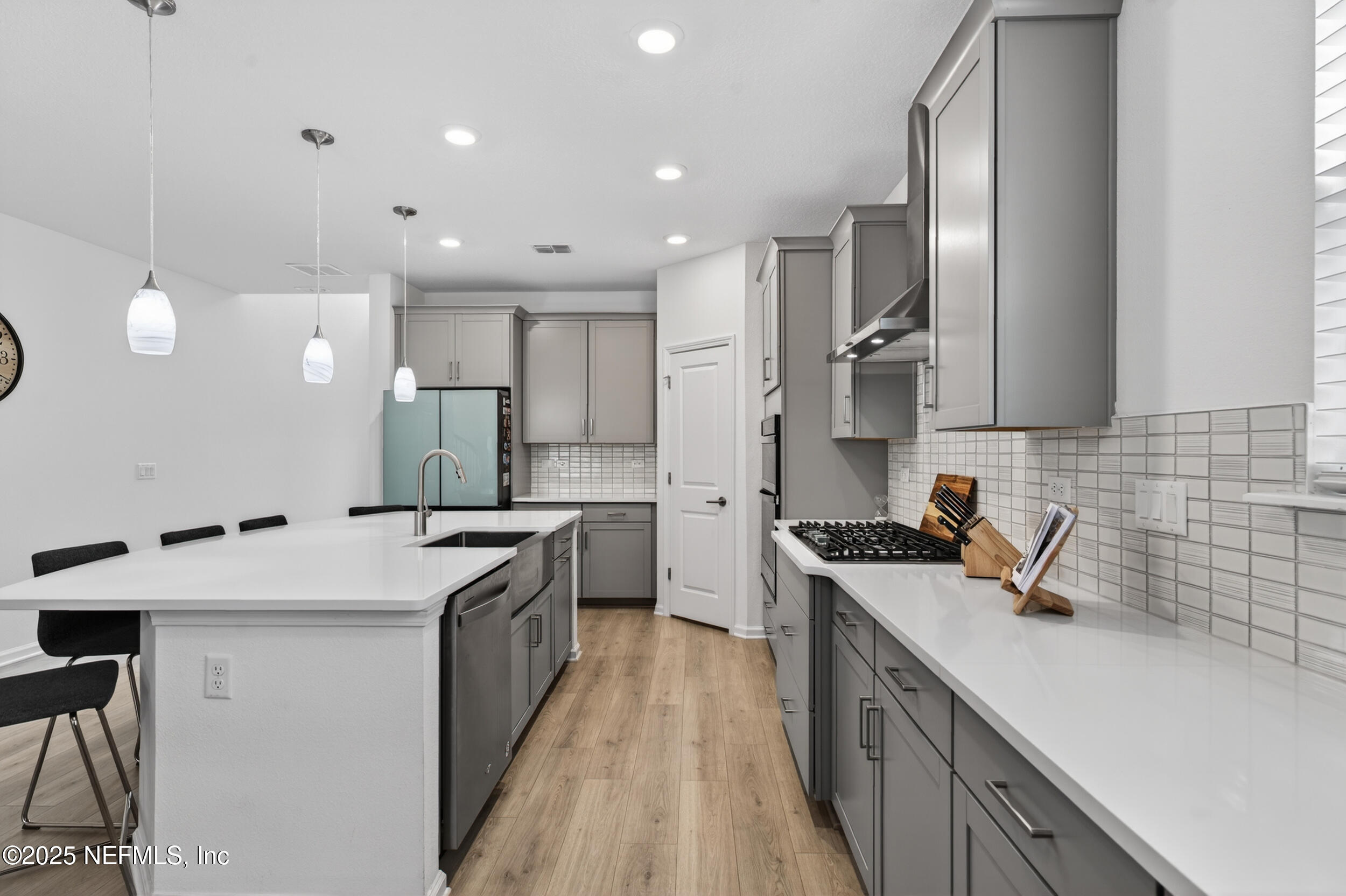 267 Twilight Lane St. Augustine, FL 32095 - Photo 9 of 50 a kitchen with a sink stove and cabinets