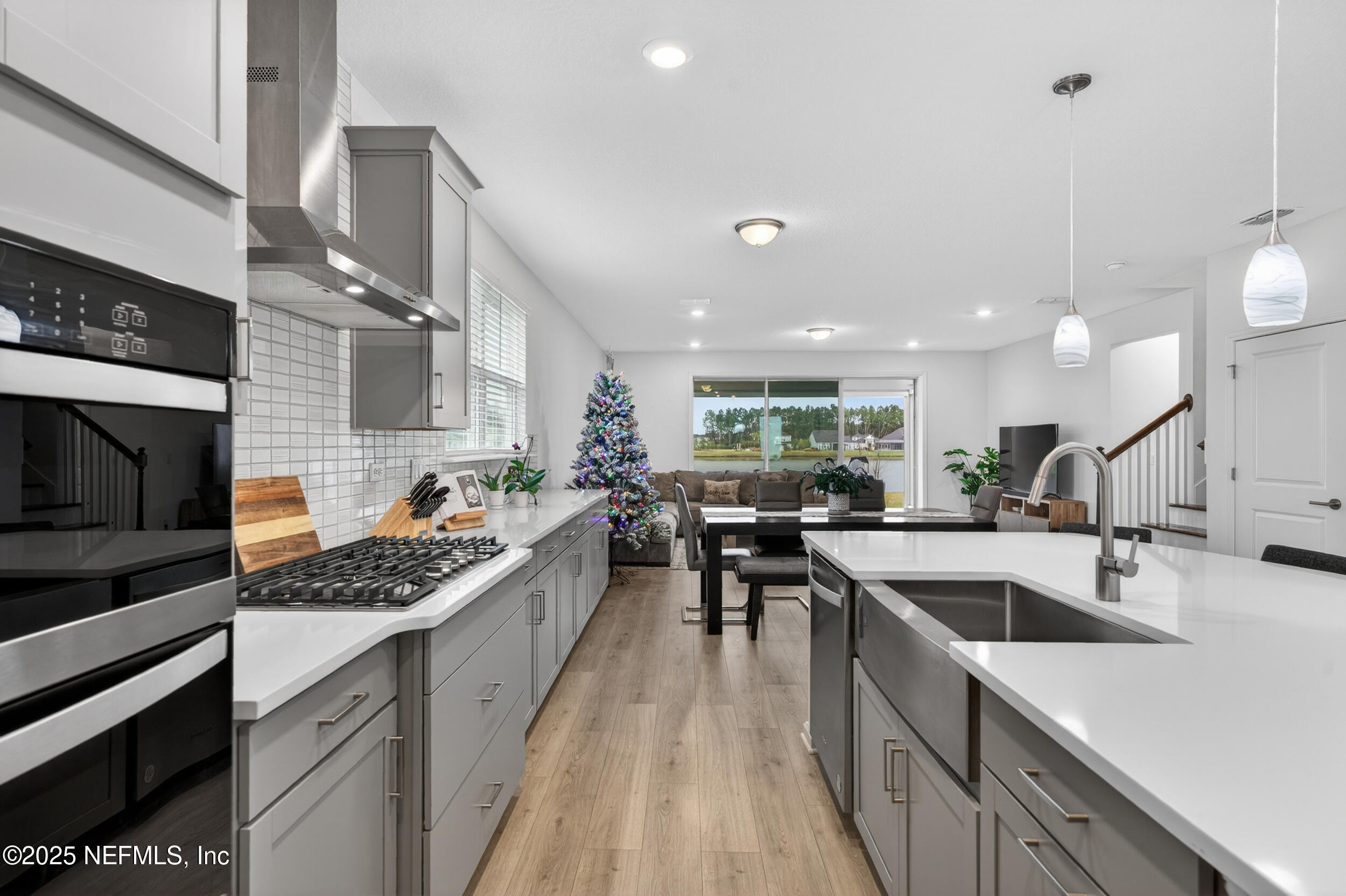 267 Twilight Lane St. Augustine, FL 32095 - Photo 10 of 50 a kitchen with lots of counter top space appliances and furniture