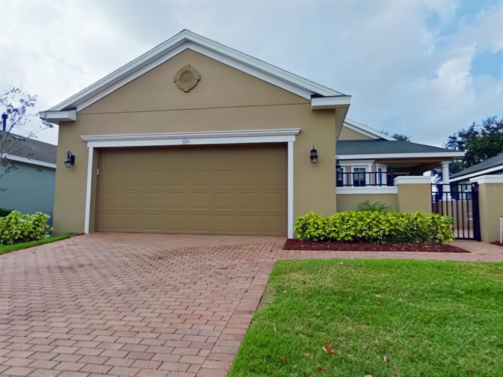 309 Silver Maple Road Groveland, FL 34736 - Photo 1 of 1 Resort Living in the Trilogy Community. Paver Driveway and sidewalk accent the Gardenia Model.