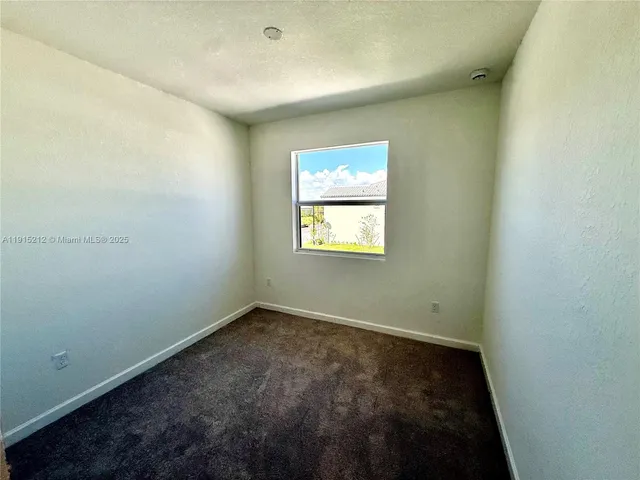 a front view of a house with yard