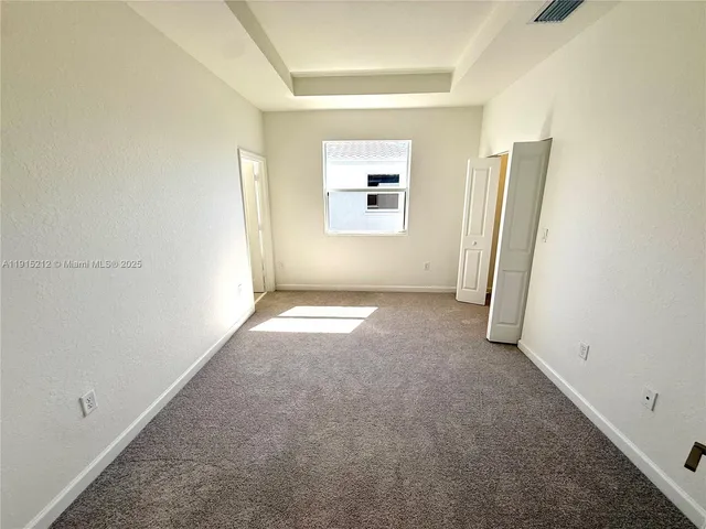 a bathroom with a toilet sink and shower