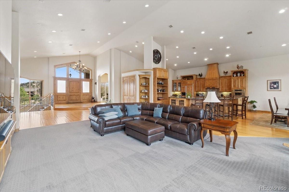 5881 Deer Meadow Trail Golden, CO 80403 - Photo 16 of 50 a living room with furniture and a large window