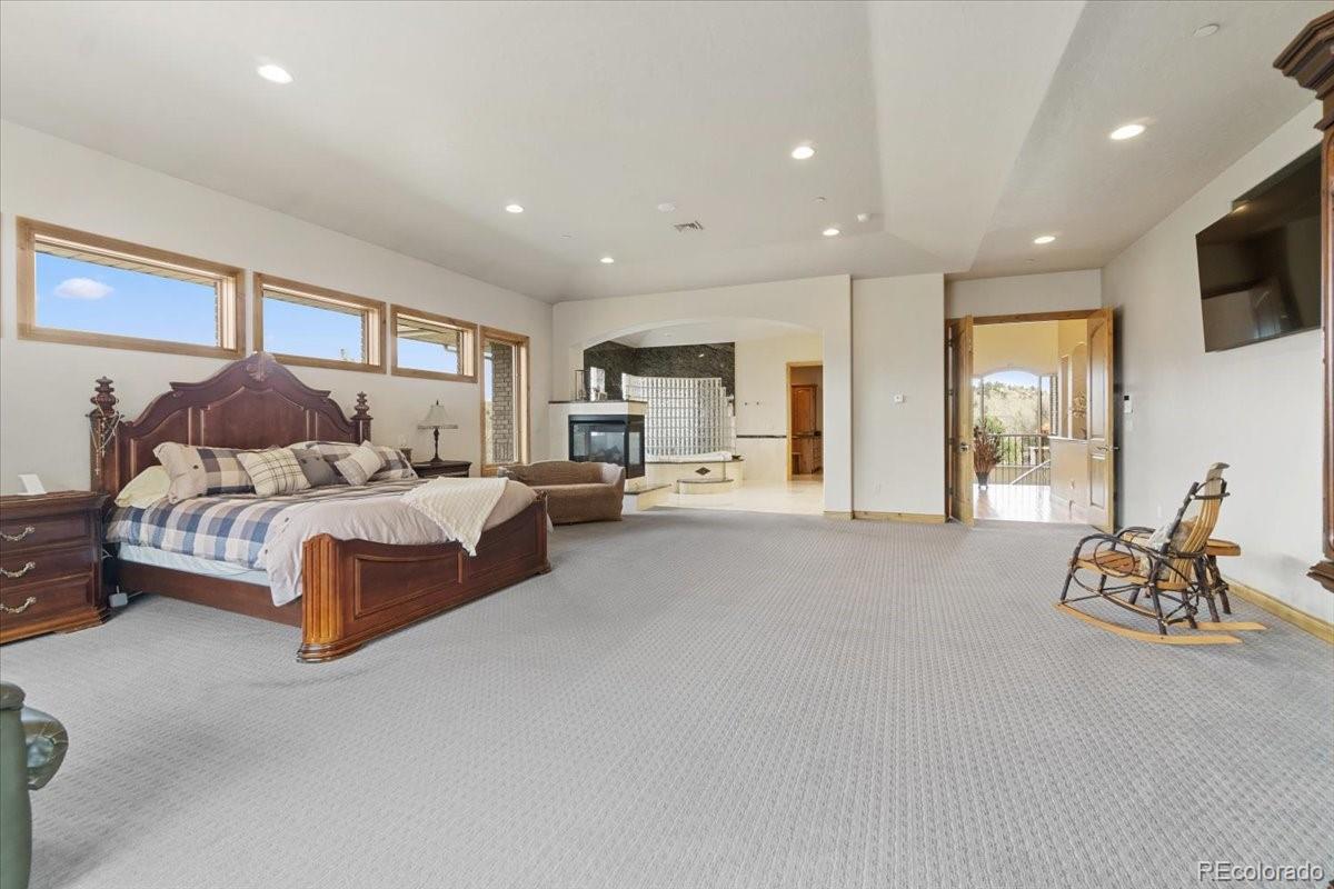 5881 Deer Meadow Trail Golden, CO 80403 - Photo 24 of 50 a living room with furniture window and flat screen tv