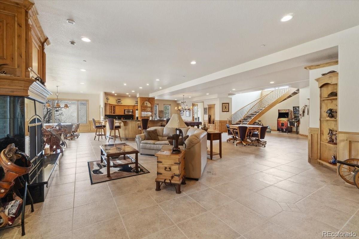 5881 Deer Meadow Trail Golden, CO 80403 - Photo 39 of 50 a view of a room with lots of chairs
