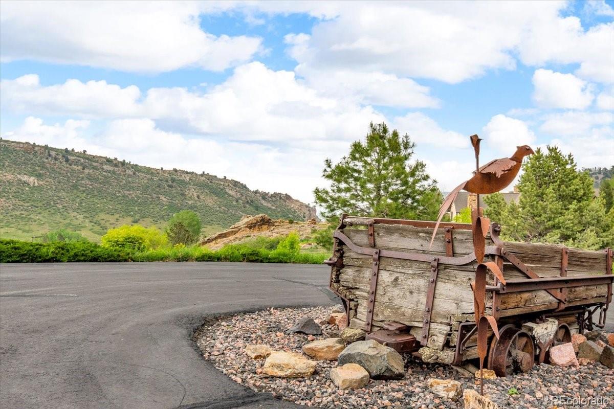5881 Deer Meadow Trail Golden, CO 80403 - Photo 9 of 50 a view of a backyard with sitting area
