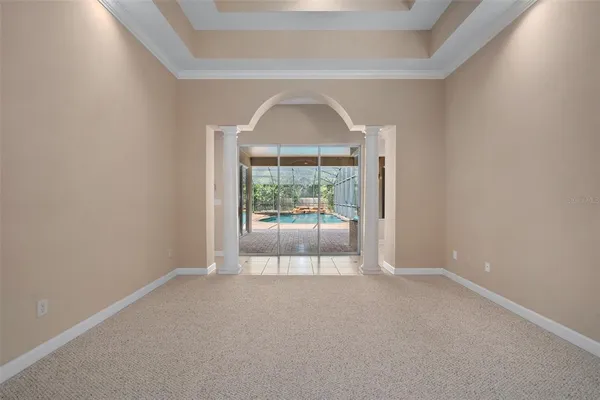 a view of an empty room with a closet