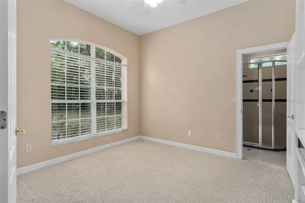 a kitchen with stainless steel appliances granite countertop a stove a sink a refrigerator and cabinets