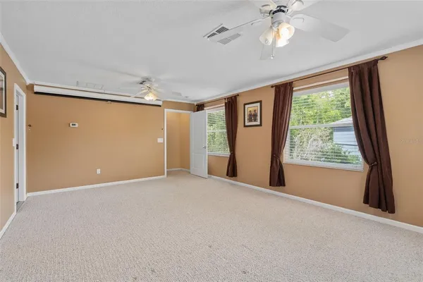 a backyard of a house with lots of green space