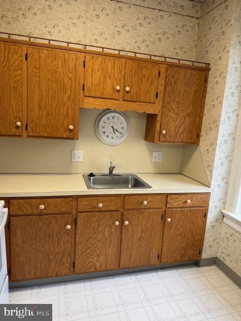 104 West Main Street, Unit 33 Waynesboro, PA 17268 - Photo 5 of 8 a view of a storage and utility room with a sink
