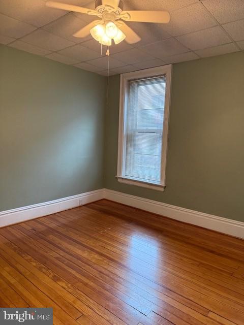 104 West Main Street, Unit 33 Waynesboro, PA 17268 - Photo 7 of 8 an empty room with wooden floor and windows
